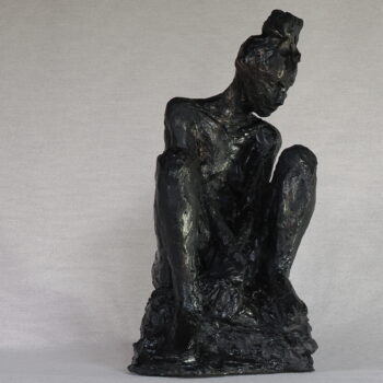 Femme assise sur un rocher 1 Femme assise sur un rocher